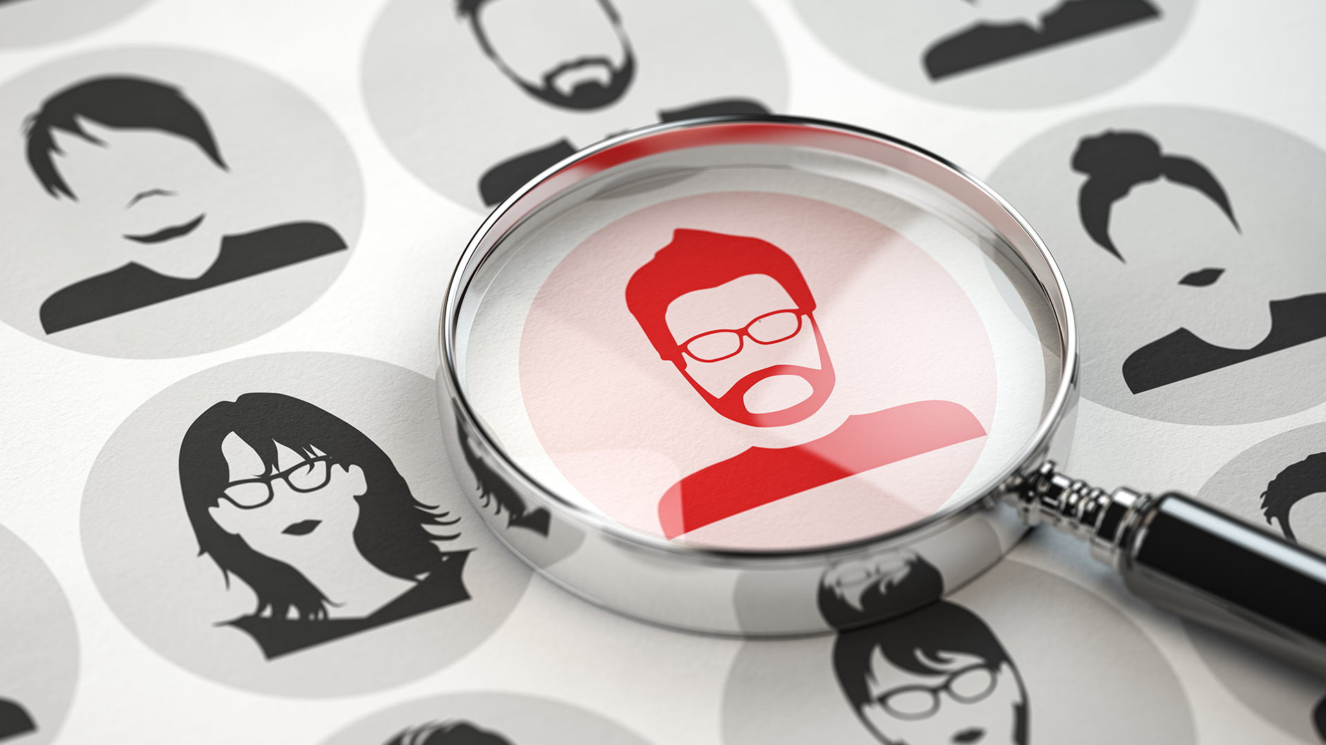 An image of a person under a magnifying glass.